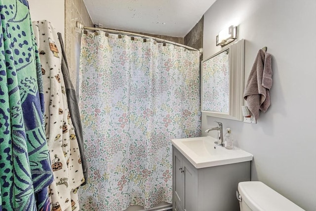 15 Ronan St Unit 3, Boston, MA 02125 - full bath with toilet, vanity, and curtained shower