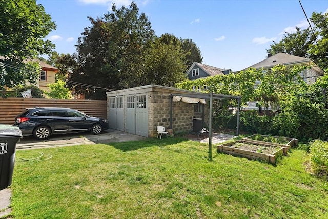 12 Leonard St, Somerville, MA 02144 - view of yard with a garden and an outbuilding