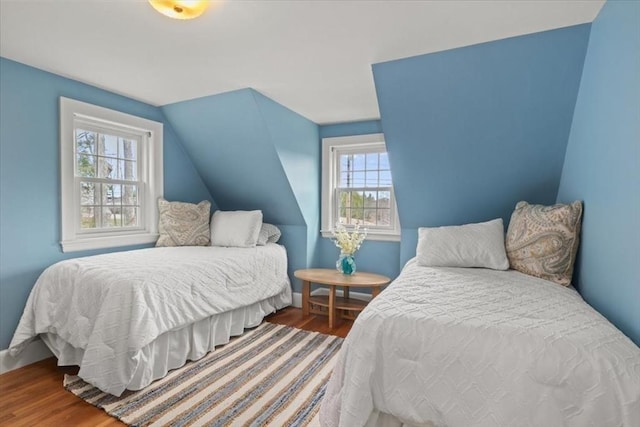 279 Norfolk St, Holliston, MA 01746 - bedroom featuring wood finished floors and lofted ceiling