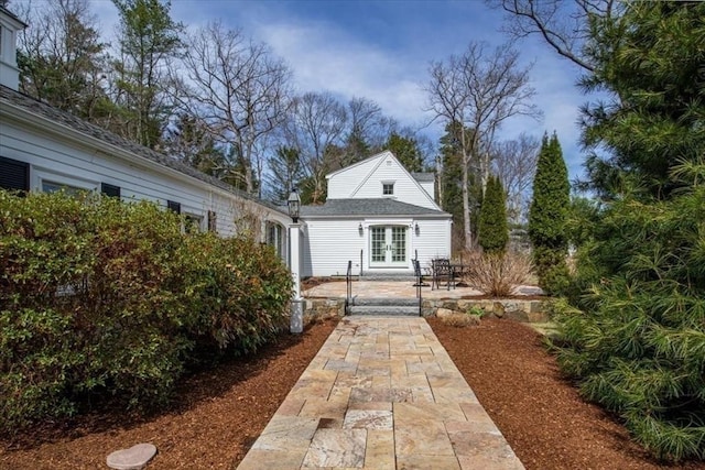 279 Norfolk St, Holliston, MA 01746 - rear view of house with french doors and a patio area