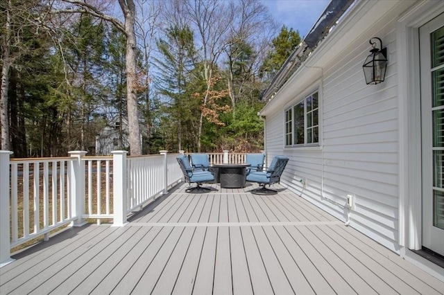 279 Norfolk St, Holliston, MA 01746 - wooden terrace featuring view of wooded area