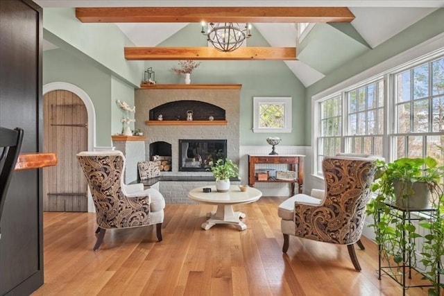 279 Norfolk St, Holliston, MA 01746 - sitting room featuring a brick fireplace and wood finished floors