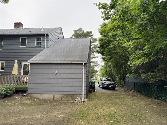 251 Waltham St, Newton, MA 02465 - rear view of property featuring a shingled roof, a chimney, and a wooden deck