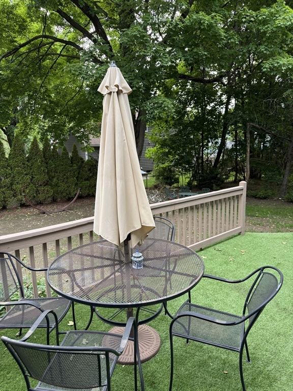 251 Waltham St, Newton, MA 02465 - deck with outdoor dining space and a yard