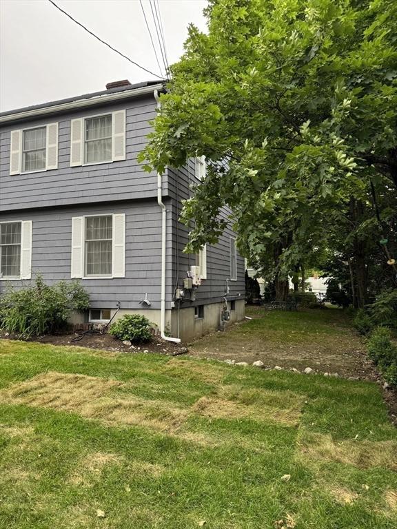 251 Waltham St, Newton, MA 02465 - view of home's exterior featuring a yard