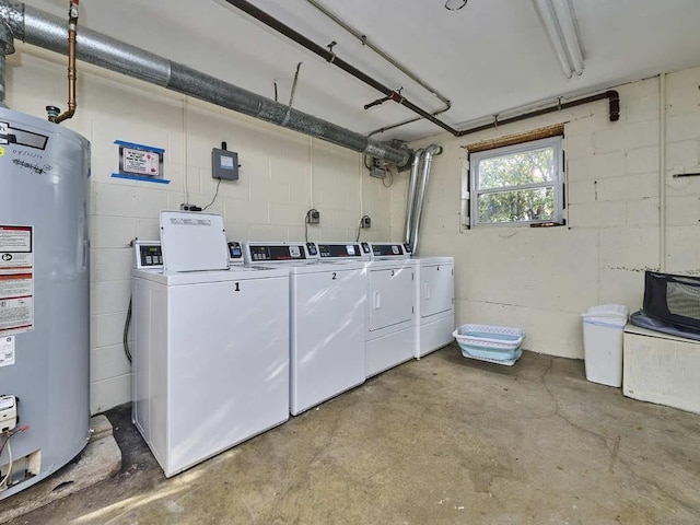 washroom featuring separate washer and dryer and water heater