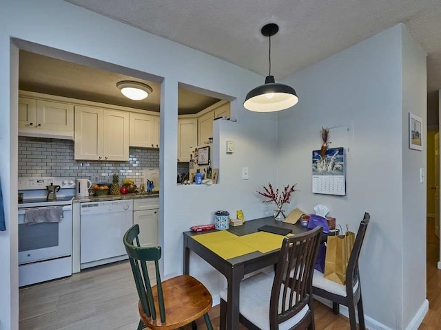 dining space featuring light hardwood / wood-style flooring