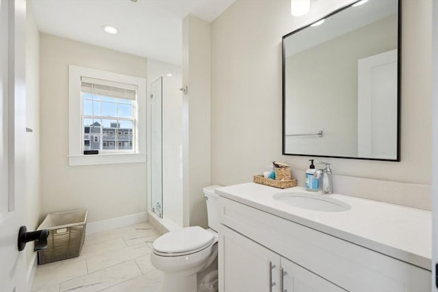 10 Berkley Rd Unit C, Hull, MA 02045 - full bath featuring marble look tile flooring, toilet, a stall shower, vanity, and baseboards