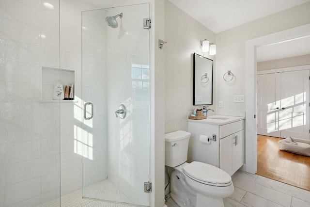 10 Berkley Rd Unit C, Hull, MA 02045 - full bathroom featuring a shower stall, vanity, and toilet