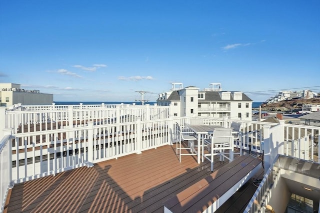 10 Berkley Rd Unit C, Hull, MA 02045 - wooden deck featuring a water view and outdoor dining area