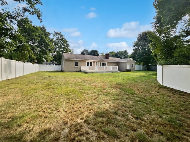 view of yard featuring a deck