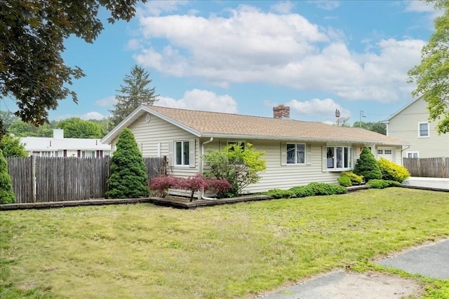 15 Trask Rd, Peabody, MA 01960 - view of front of house with a chimney, an attached garage, and driveway