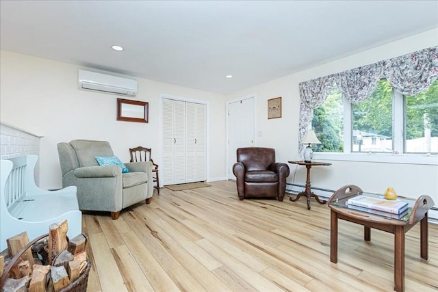 15 Trask Rd, Peabody, MA 01960 - sitting room featuring a wall mounted air conditioner, light wood-style flooring, and recessed lighting