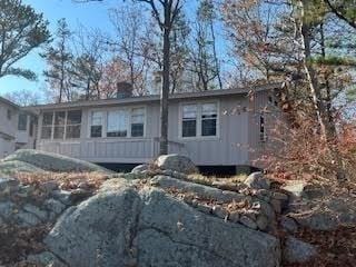 view of front of property with a chimney