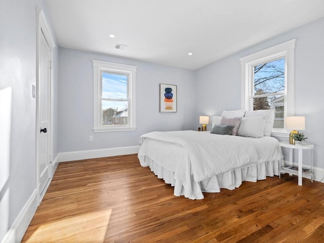 bedroom with light wood-type flooring