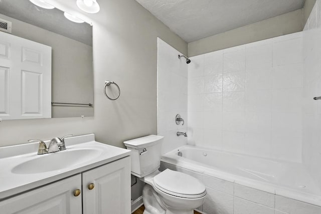 full bathroom featuring toilet, vanity, and shower / washtub combination