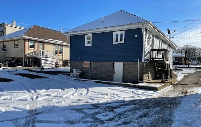 view of snow covered house