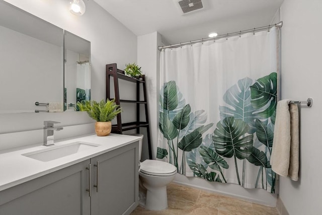 full bathroom featuring toilet, vanity, and shower / bathtub combination with curtain