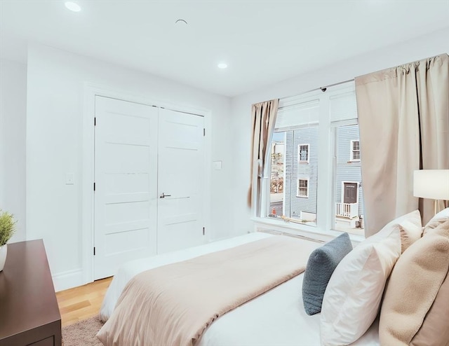 56 Belmont St Unit 3, Boston, MA 02129 - bedroom featuring light wood-type flooring, recessed lighting, and a closet