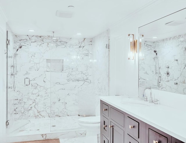 56 Belmont St Unit 3, Boston, MA 02129 - bathroom with a marble finish shower, vanity, marble finish floors, and recessed lighting
