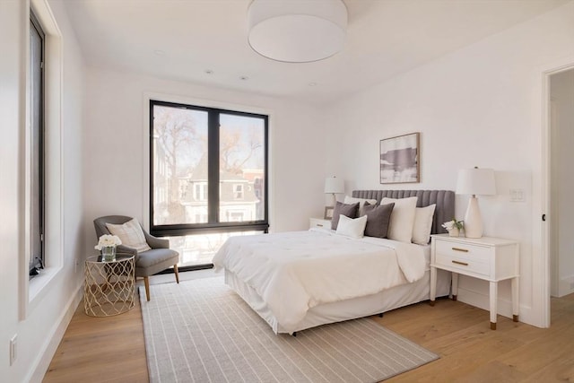 bedroom featuring light wood-type flooring