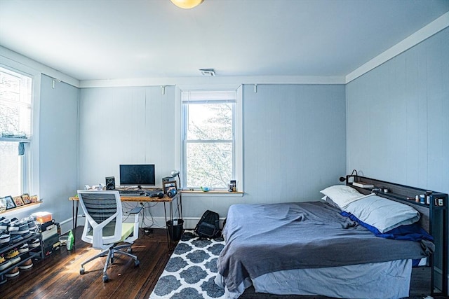38 Highland Park Ave, Boston, MA 02119 - bedroom featuring ornamental molding, visible vents, and wood finished floors