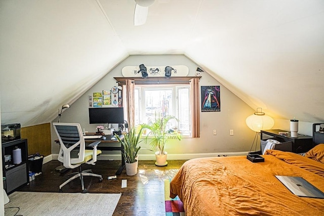 38 Highland Park Ave, Boston, MA 02119 - bedroom with lofted ceiling, baseboards, and wood finished floors