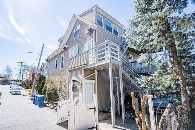 38 Highland Park Ave, Boston, MA 02119 - view of front facade featuring stairway
