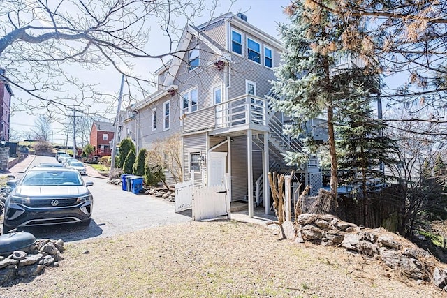 38 Highland Park Ave, Boston, MA 02119 - back of house with stairway