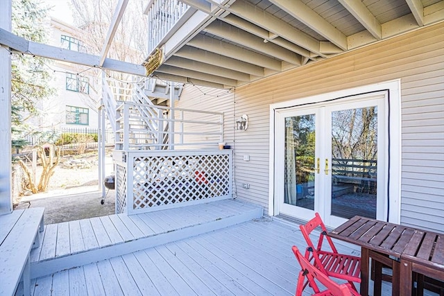 38 Highland Park Ave, Boston, MA 02119 - wooden terrace with french doors