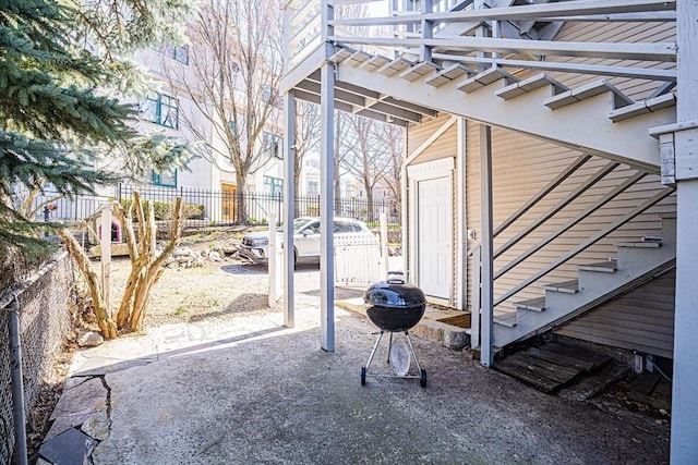 38 Highland Park Ave, Boston, MA 02119 - view of patio / terrace featuring grilling area, fence, and stairway