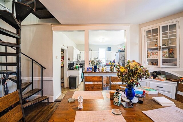 38 Highland Park Ave, Boston, MA 02119 - dining space featuring stairs