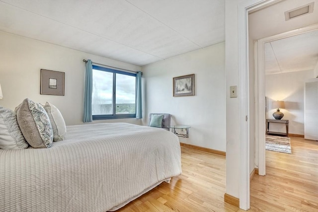 49 Melrose St Unit 7F, Melrose, MA 02176 - bedroom featuring light wood finished floors and a heating unit