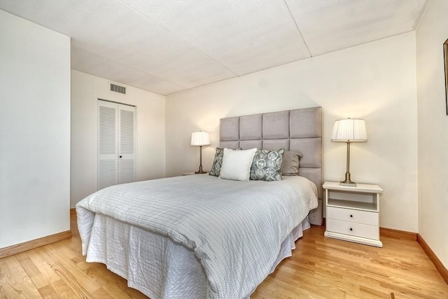 49 Melrose St Unit 7F, Melrose, MA 02176 - bedroom featuring light wood finished floors and a closet