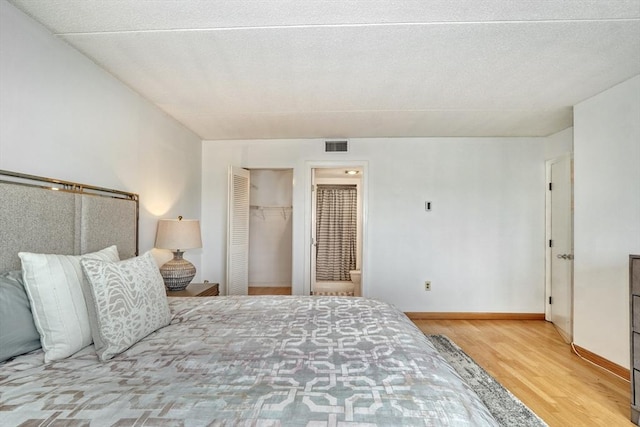 49 Melrose St Unit 7F, Melrose, MA 02176 - bedroom featuring wood finished floors and a closet
