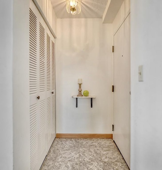 49 Melrose St Unit 7F, Melrose, MA 02176 - corridor featuring baseboards