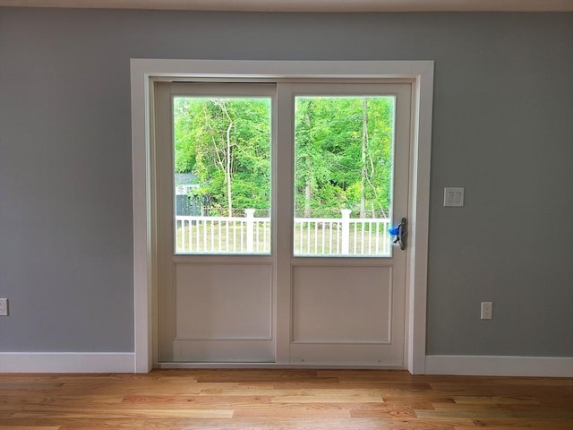 54 Federal St, Weymouth, MA 02188 - entryway with plenty of natural light, baseboards, and light wood finished floors