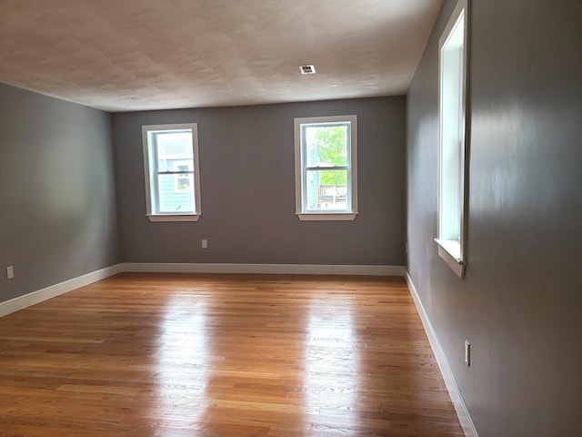 54 Federal St, Weymouth, MA 02188 - empty room featuring light wood-type flooring and baseboards