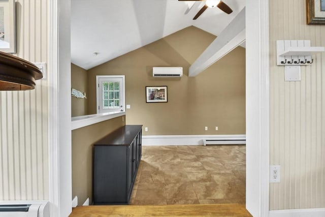 interior space with lofted ceiling, a baseboard heating unit, and a wall mounted AC