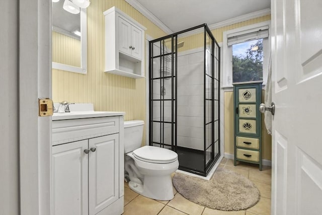 bathroom featuring tile patterned flooring, ornamental molding, toilet, walk in shower, and vanity