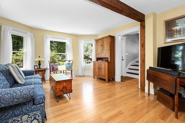 40 Maple St, Mansfield, MA 02048 - living room featuring light wood-style floors and stairway