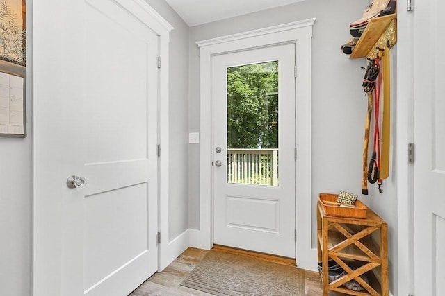 40 Maple St, Mansfield, MA 02048 - doorway featuring light wood-style floors and baseboards
