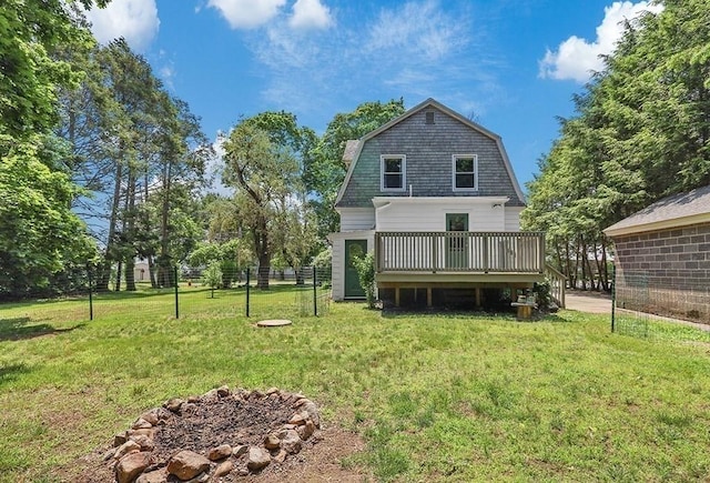 40 Maple St, Mansfield, MA 02048 - back of house with a deck and a gambrel roof