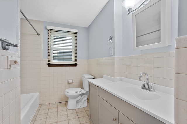 full bathroom with backsplash, toilet, tile walls, shower / bath combination, and vanity