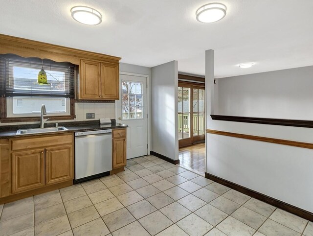 kitchen with stainless steel appliances and light hardwood / wood-style floors