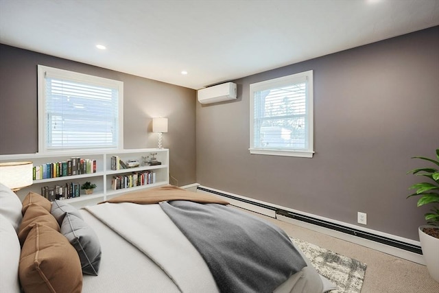 carpeted bedroom featuring a baseboard radiator and a wall unit AC