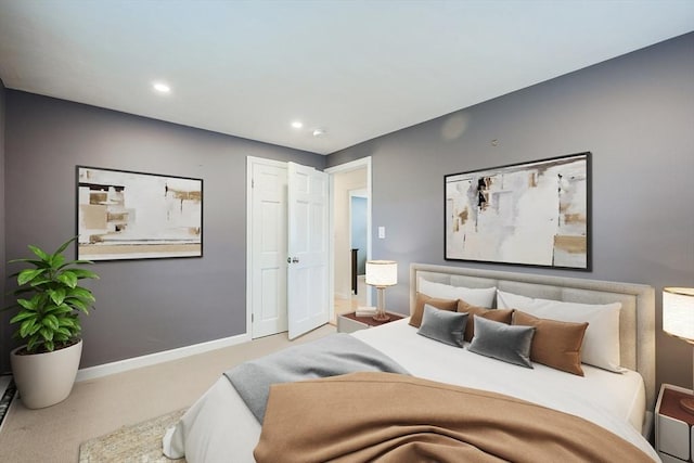 bedroom featuring light colored carpet