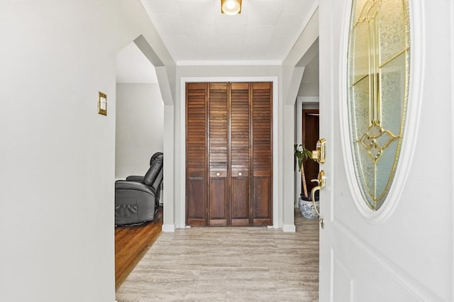 foyer featuring light wood-style floors