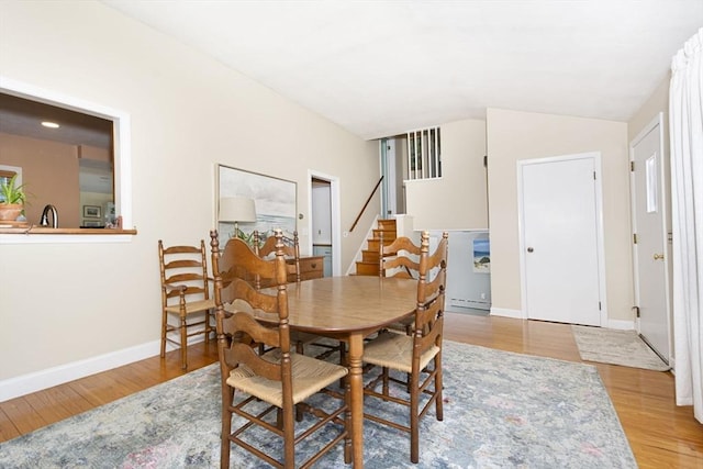 12 Crosby, Webster, MA 01570 - dining area with stairway, wood finished floors, baseboards, and lofted ceiling