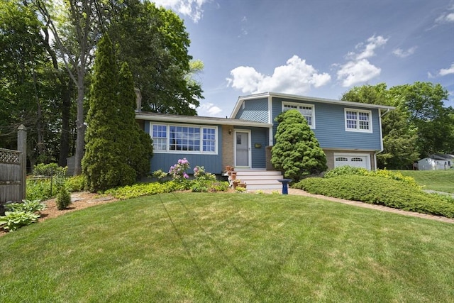 12 Crosby, Webster, MA 01570 - tri-level home with an attached garage and a front lawn
